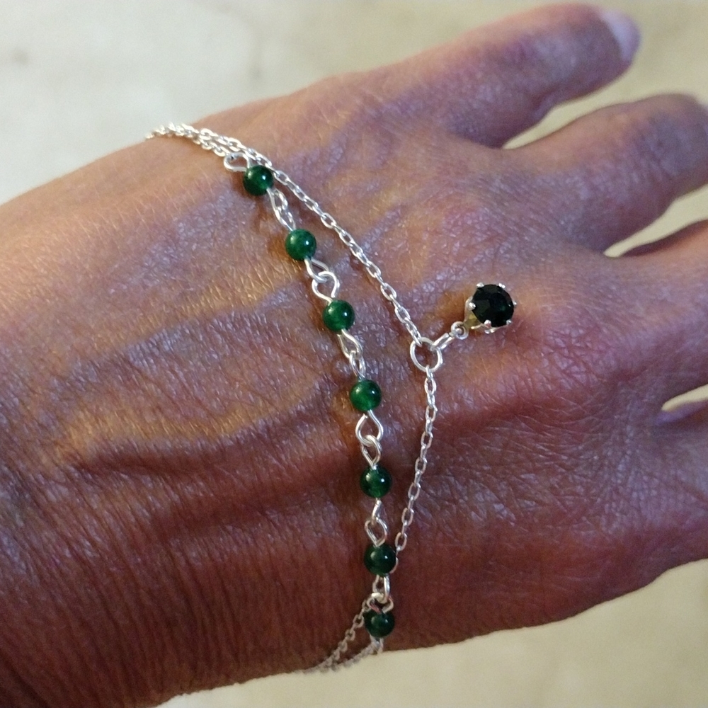 Emerald and silver anklet bracelet.
